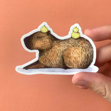 Load image into Gallery viewer, Capybara Laying Down Vinyl Die Cut Weatherproof Sticker
