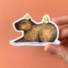 Load image into Gallery viewer, Capybara Laying Down Vinyl Die Cut Weatherproof Sticker